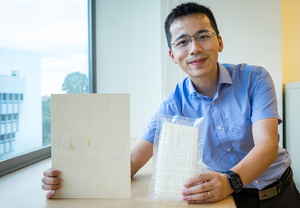 Comparing the stiffened chain mail fabric to a piece of wood