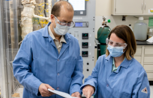 Researchers reviewing experiment results.