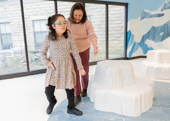 After receiving gene therapy at The Ohio State University Wexner Medical Center, Delilah can now feed herself, communicate more and even walk by herself (IMAGE)