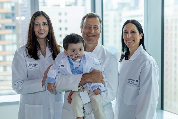 Baby Benjamin Carstens with pediatric hepatologist Dana L. Goldner, MD, pediatric liver surgeon Adam Griesemer, MD, and pediatric hepatologist Jennifer M. Vittorio, MD.