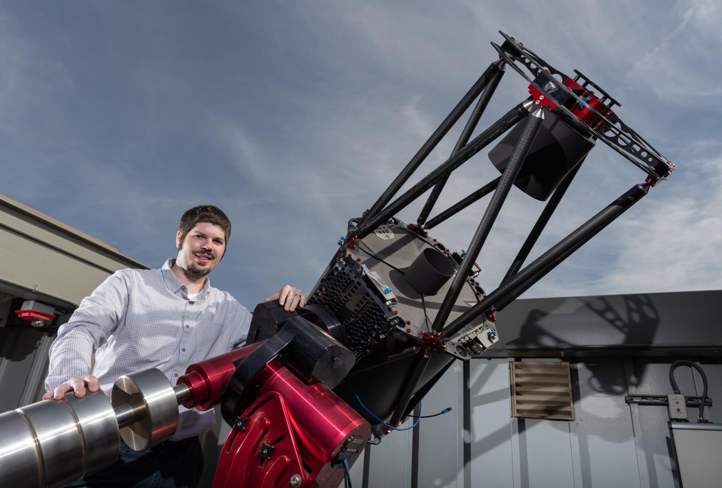Astrophysicist with telescope