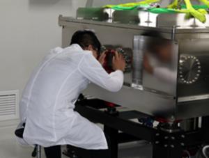 The students are checking the optical chamber