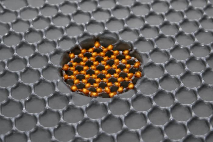 Figure 1. One common method for synthetizing 2D metals, with iron element as an example, viz., 2D metals (2D iron membrane) grew inside graphene nanopores from Fe3+ precursors under electron beam irradiation