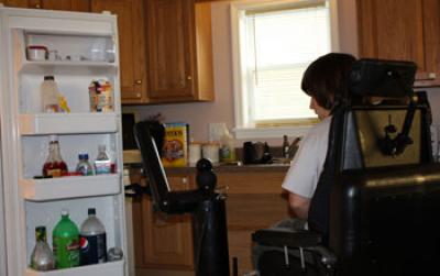 Disabled Person Pilots a Robotic Mobility and Manipulation System to Open Door