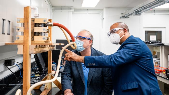 Sanza Kazadi and Ralph Muehleisen in Lab