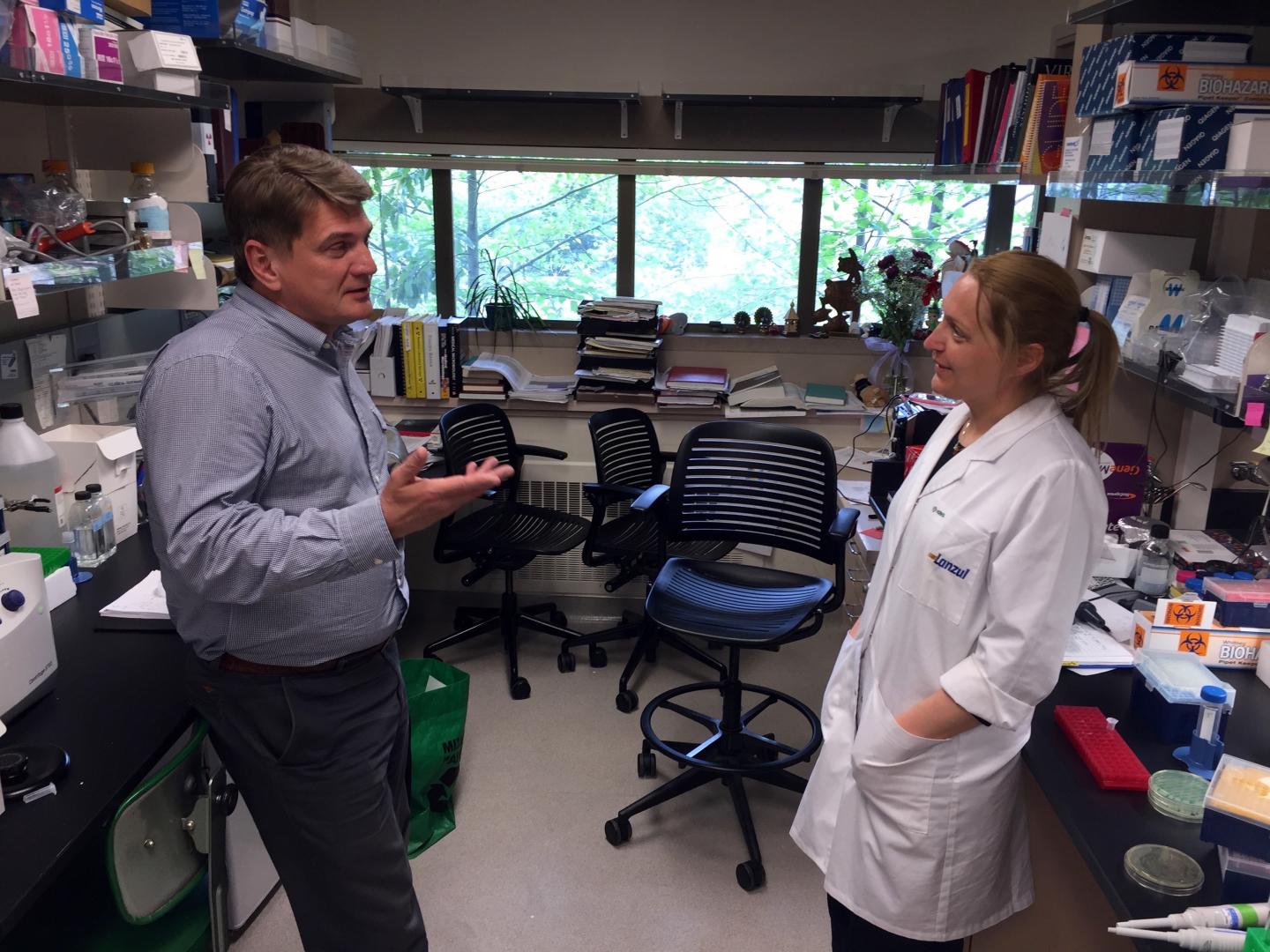 Evgeni V. Sokurenko and Dagmara I. Kisiela in Their Laboratory