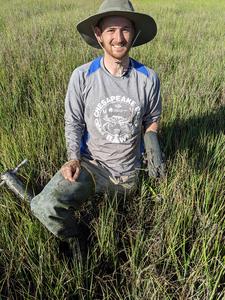 Kyle Runion holding soil core