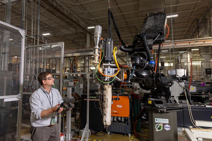 Additive manufacturing-compression molding (AMCM) system