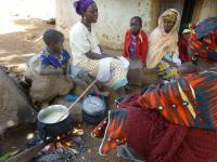 Women cooking together in Kouroupampa (Guinea)