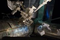 Astronauts Moving the RRM