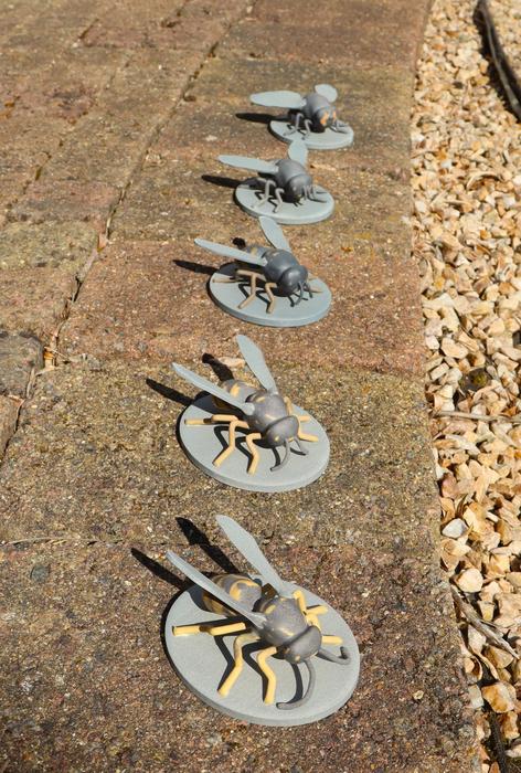 3D printed models of a common wasp. The model in front is life-sized.