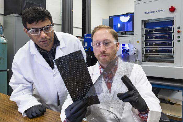 Nanofibers yield stronger, tougher carbon fiber composites