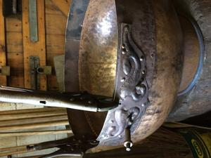 Fitting the mount plates to the cauldron wall