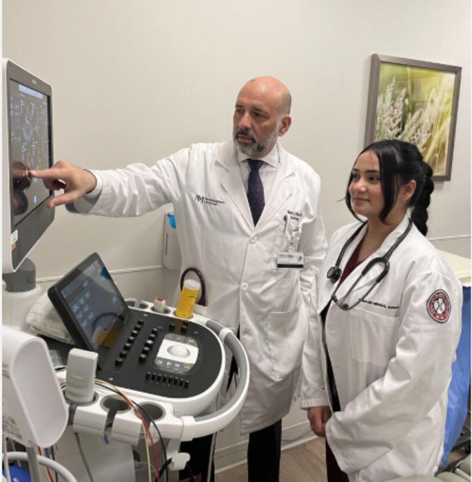 Study senior author and Northwestern cardiologist Dr. Micah Eimer pointing at an echocardiographic (ultrasound) image of the heart