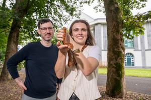 Dr Kevin Healy and Amy Duclaux from the School of Natural Sciences, University of Galway, with a corn snake. Credit Andrew Downes, Xposure.