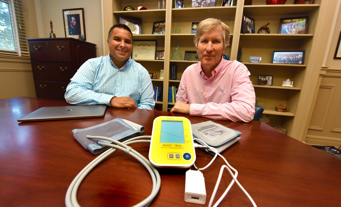 Kris Dhandapani (left) and David Hess
