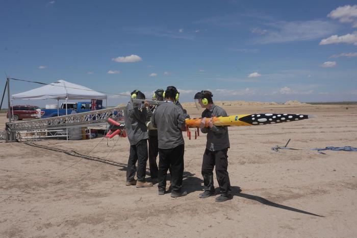 The team onsite at Texas during competition setting up Pardalote.