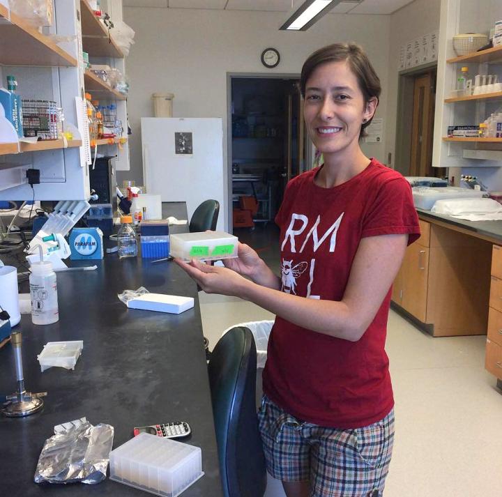 Researcher Holds Trial Tray - Harvested Yest