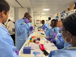 Scientists in the laboratory during the 2024 workshop organised by PulseNet