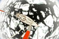 Sky View of the Tara Sailing through Ice Chunks