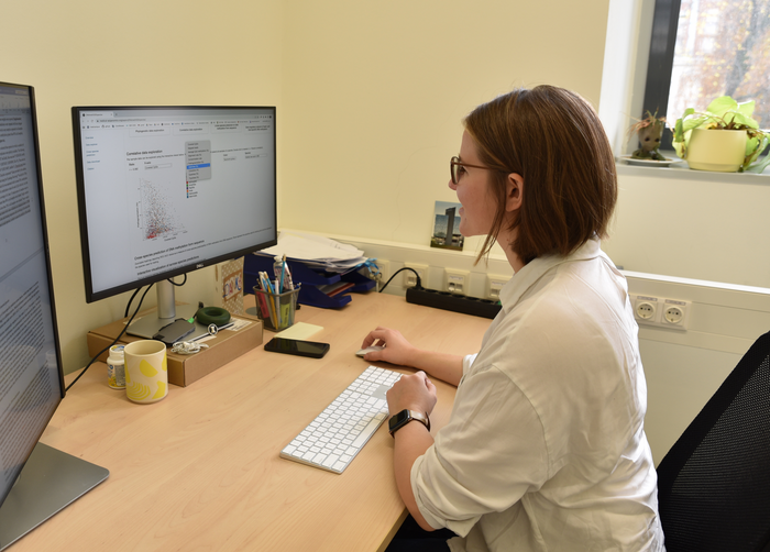 Daria Romanovskaia analyzing the data