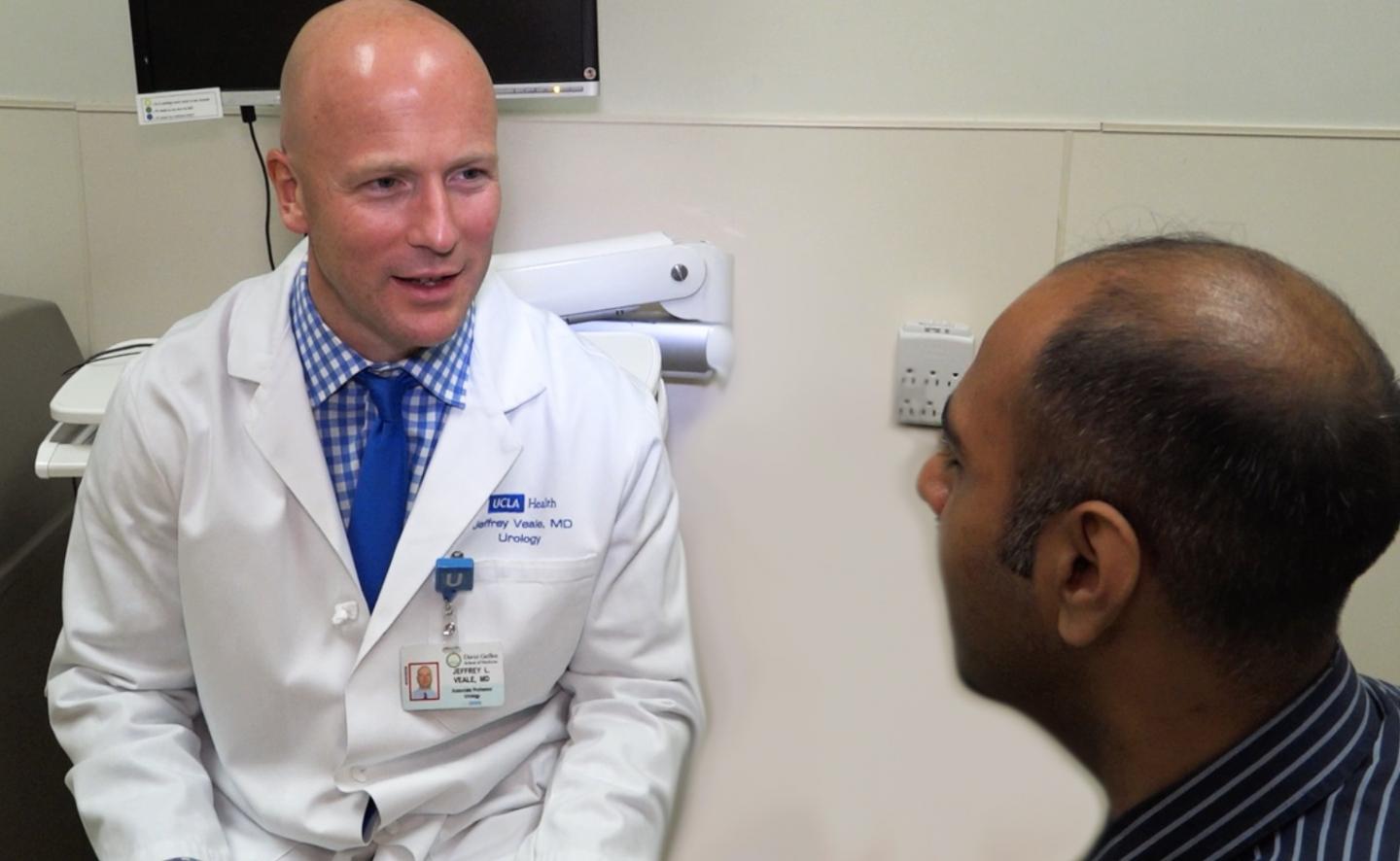Dr. Veale with Patient