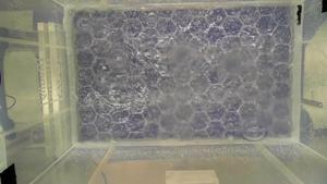 A video showing the process of cryovolcanism in the Large Dirty Mars Chamber, housed at the Open University.