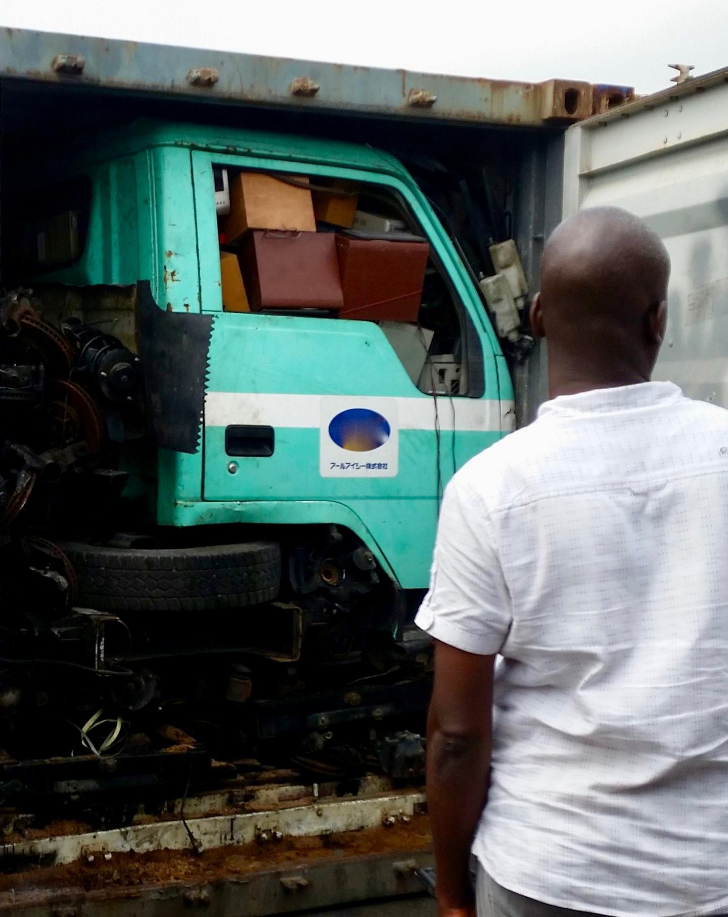 Truck Cab Packed with Boxes Arriving into Nigeria in a Container