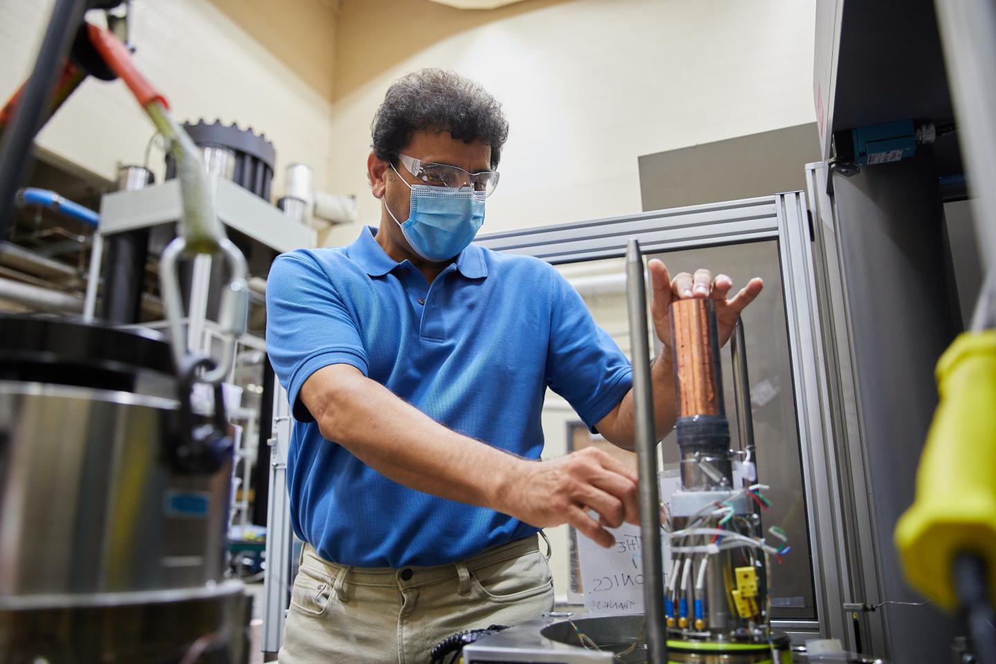Ghassemi Working with a Core Sample