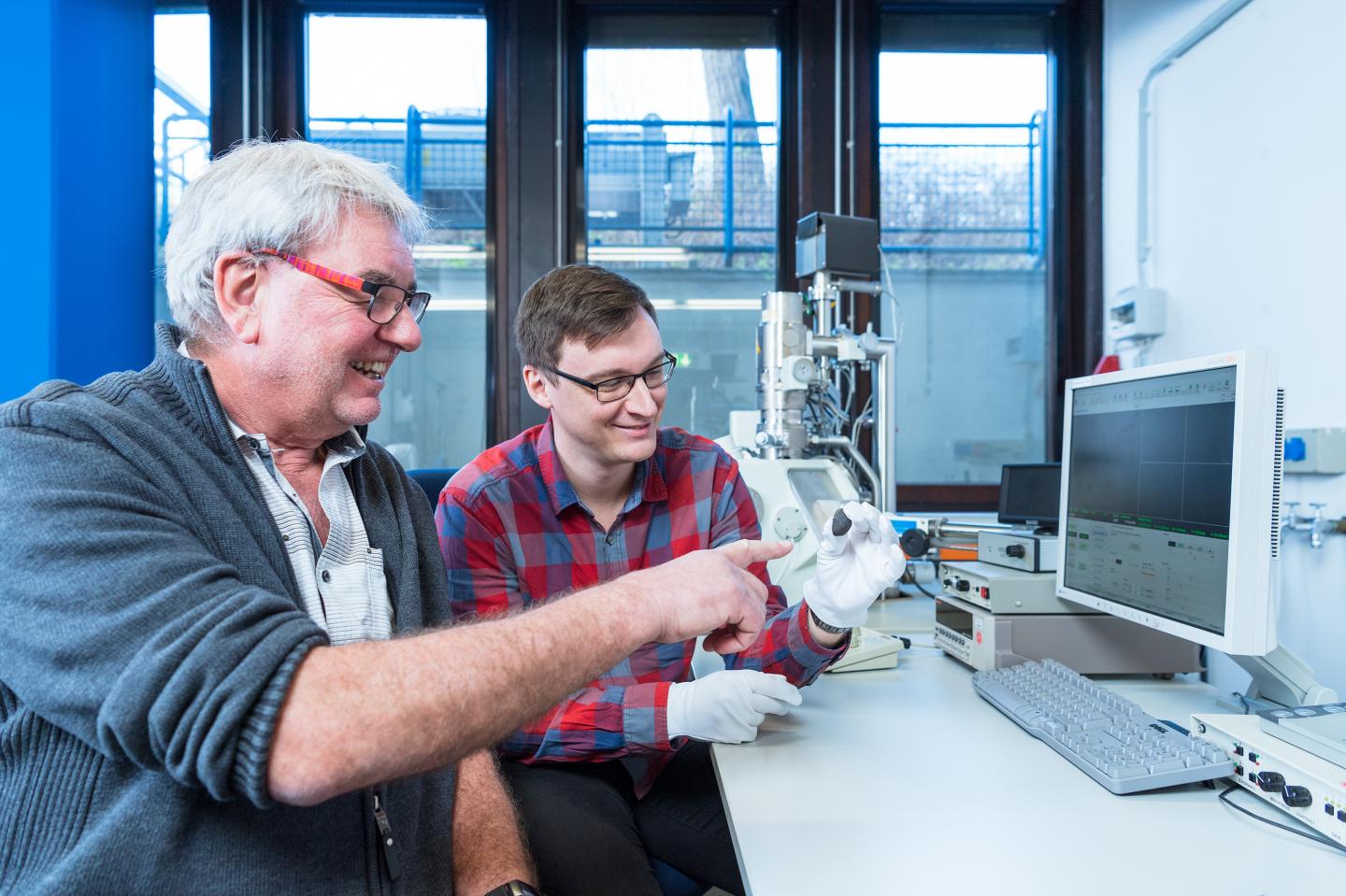 Planetologists with Meteorite