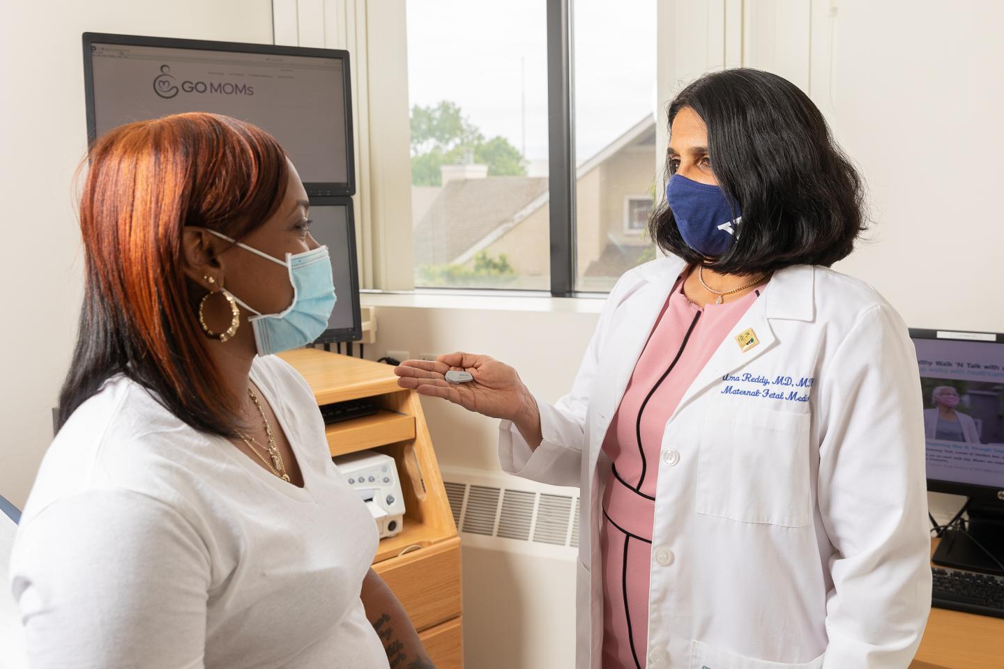 Dr. Uma Reddy and study participant Regina McCabe