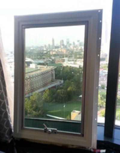 A Shaded Window next to a Regular Window