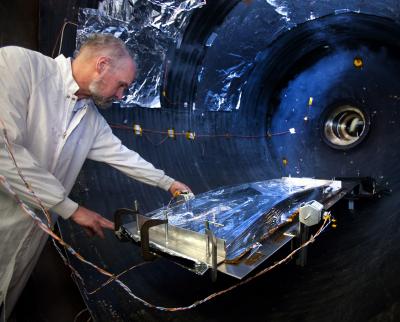 Sunshield Test Article being placed in the Vacuum Chamber