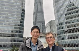 Dr. Qi Zhang and Prof. Dr. Ben Feringa in front of Shanghai Tower