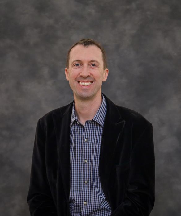 Dr. Owen Carmichael