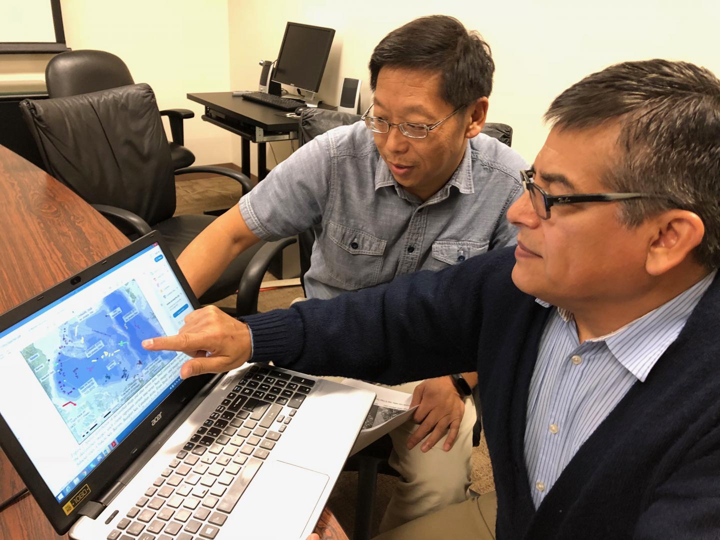 Hongjie Xie and Alberto Nunez ArcCI