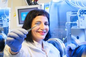 NTU Assoc Prof Annalisa Bruno seeing through the ultrathin perovskite solar cell which is just 10 nanometres.