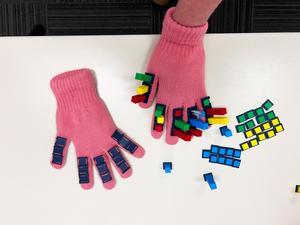 New wearable glove uses heat to help people feel their data