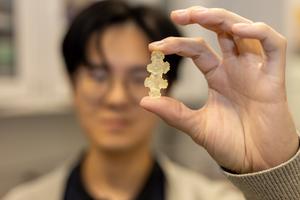 Researcher with Sclerite Model