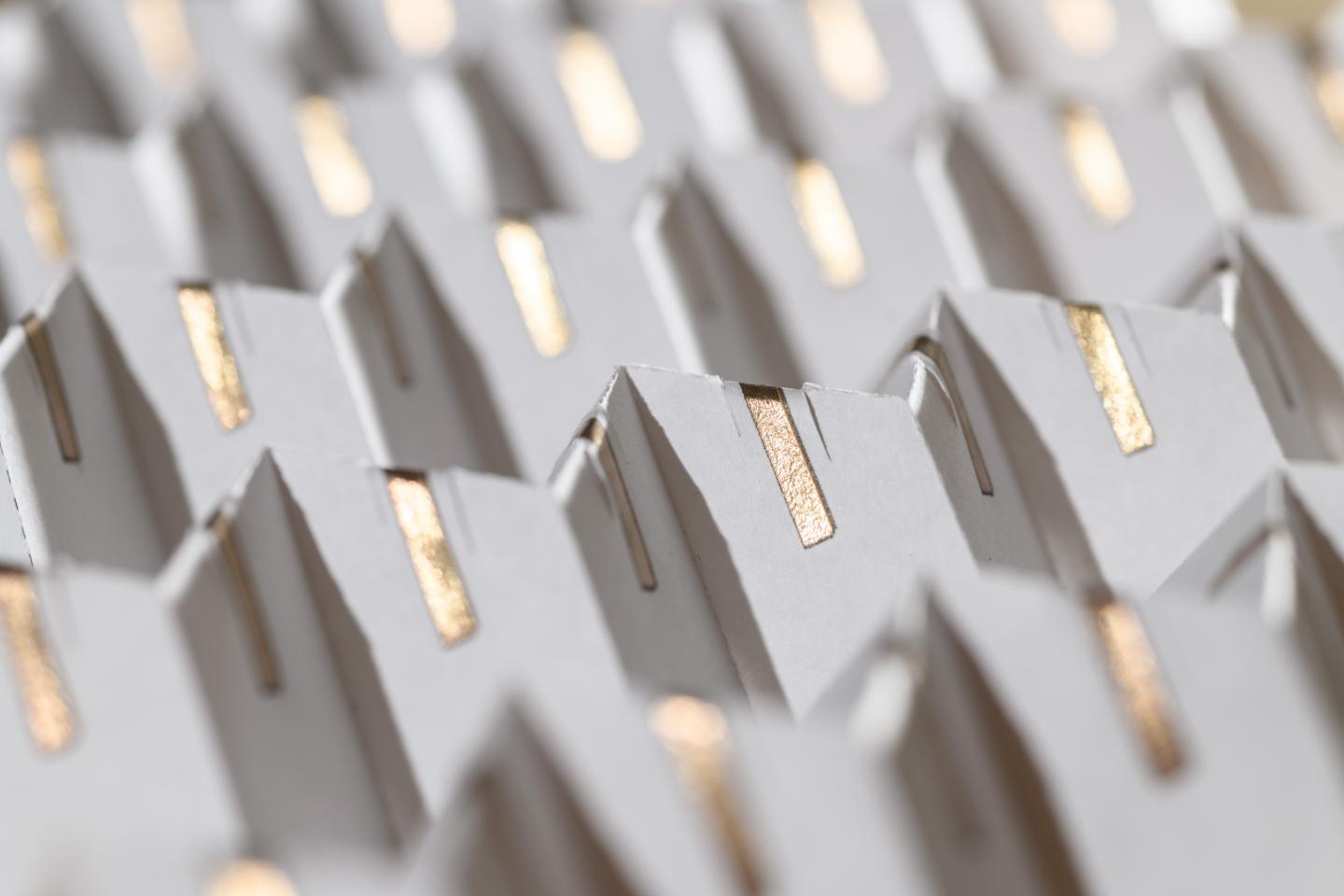 Continuously Tunable Origami-Based Frequency Select Surface