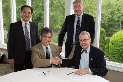 JAX, ASHG Officials Sign Agreement