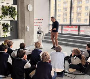 Konrad Maj (Ph.D.) and Pepper