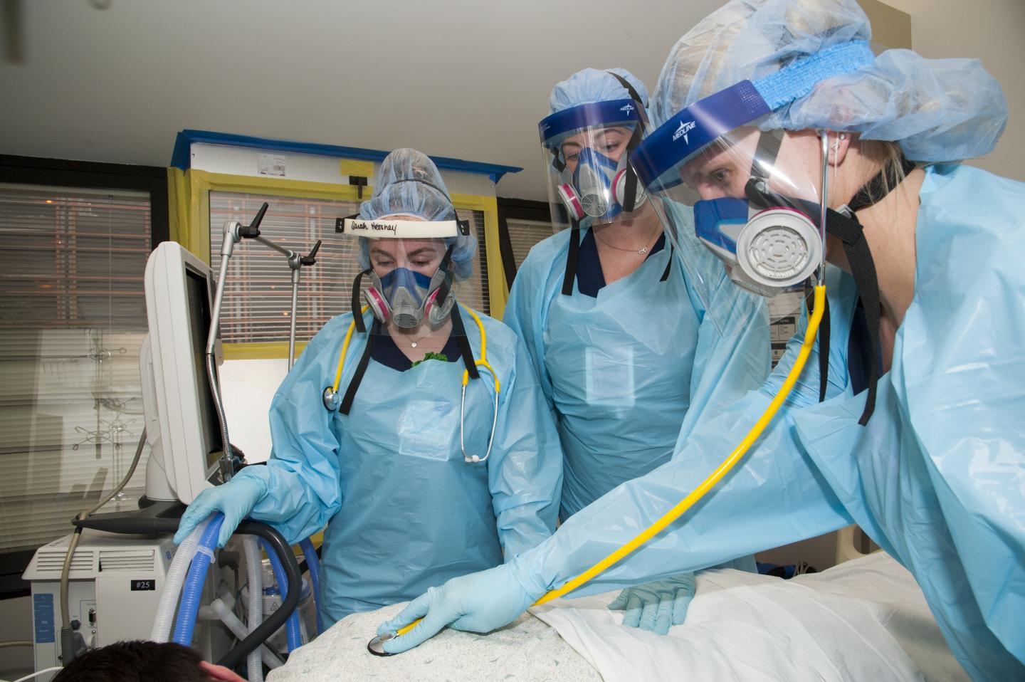 Nurses wearing elastomeric masks