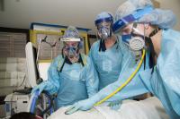 Nurses wearing elastomeric masks