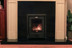 Photo of domestic stove burning “low smoke” ovoid coal. Photo: Martina Regan