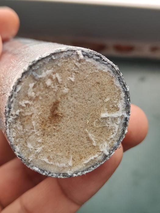 Rock core with polymer on the surface