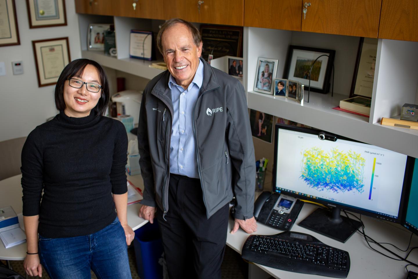 Researchers with Model