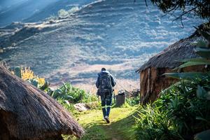 Lay health worker on his way to a patient