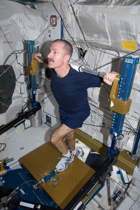 NASA astronaut Dan Burbank exercises using the advanced Resistive Exercise Device in the Tranquility node of the International Space Station. Credit: NASA
