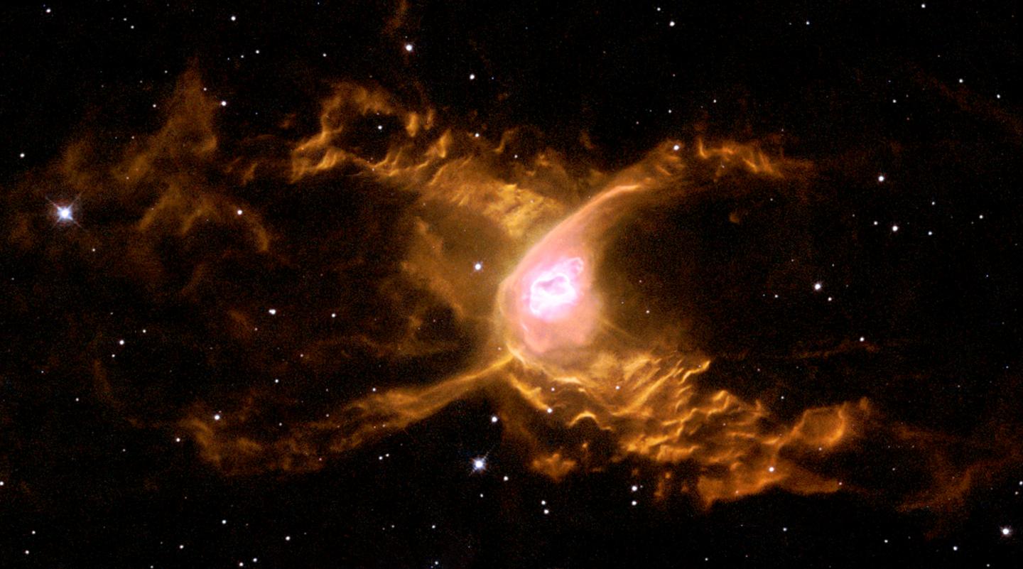 Hubble Spins a Web Into a Giant Red Spider Nebula